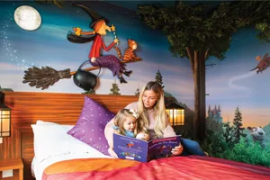 Woman and young girl in the Room on the Broom themed room