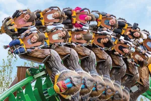 People on Mandrill Mayhem roller coaster at Chessington World of Adventures Resort