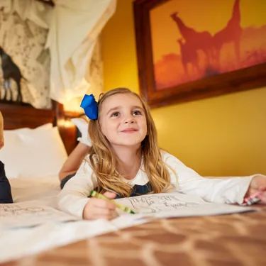 A Giraffe Room In The Chessington Safari Hotel - children reading book